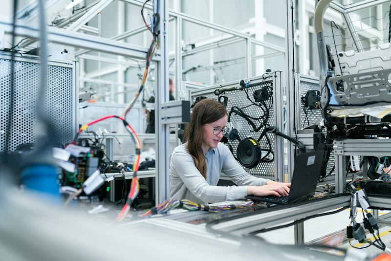 Technician diagnosing electronic equipment